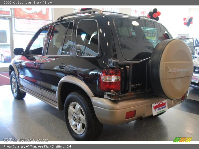 Black / Brown 2002 Kia Sportage