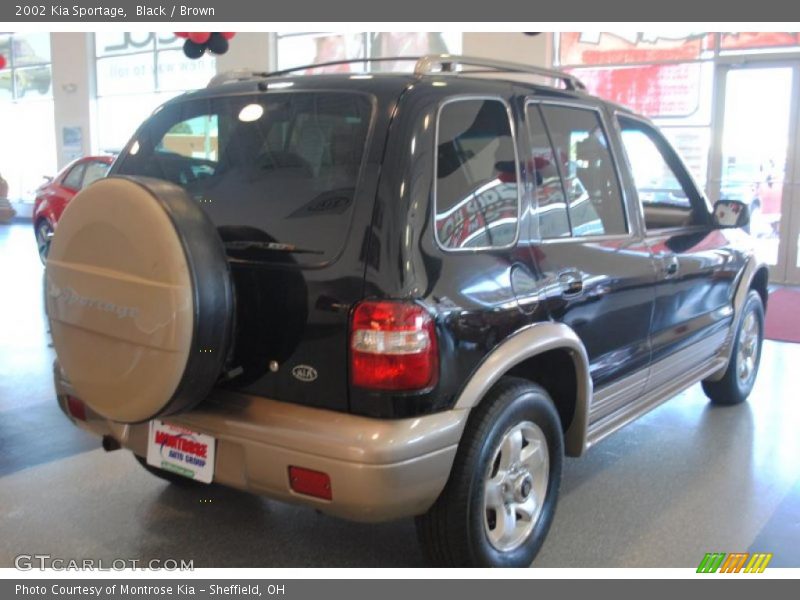 Black / Brown 2002 Kia Sportage