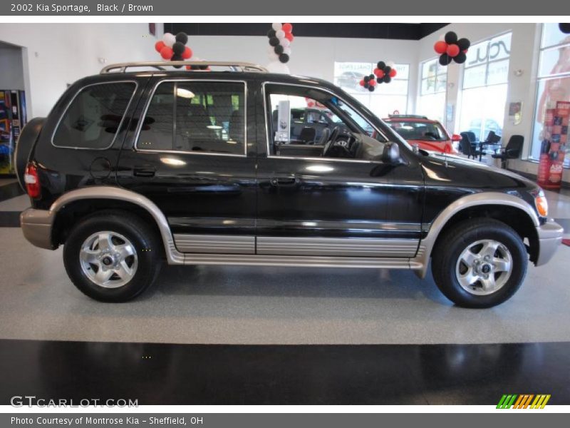 Black / Brown 2002 Kia Sportage