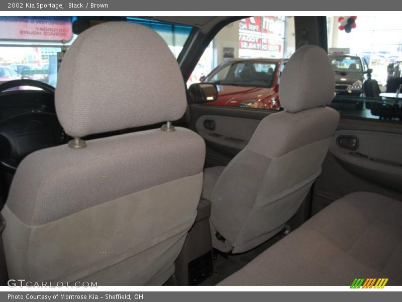 Black / Brown 2002 Kia Sportage