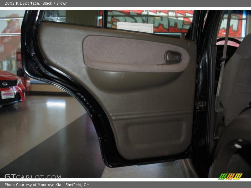 Black / Brown 2002 Kia Sportage