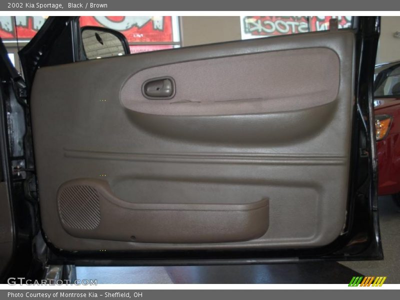 Black / Brown 2002 Kia Sportage