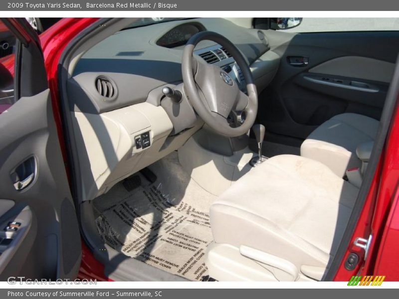 Barcelona Red Metallic / Bisque 2009 Toyota Yaris Sedan