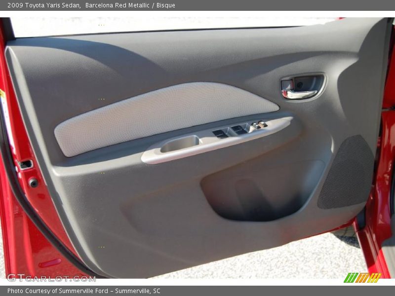 Barcelona Red Metallic / Bisque 2009 Toyota Yaris Sedan