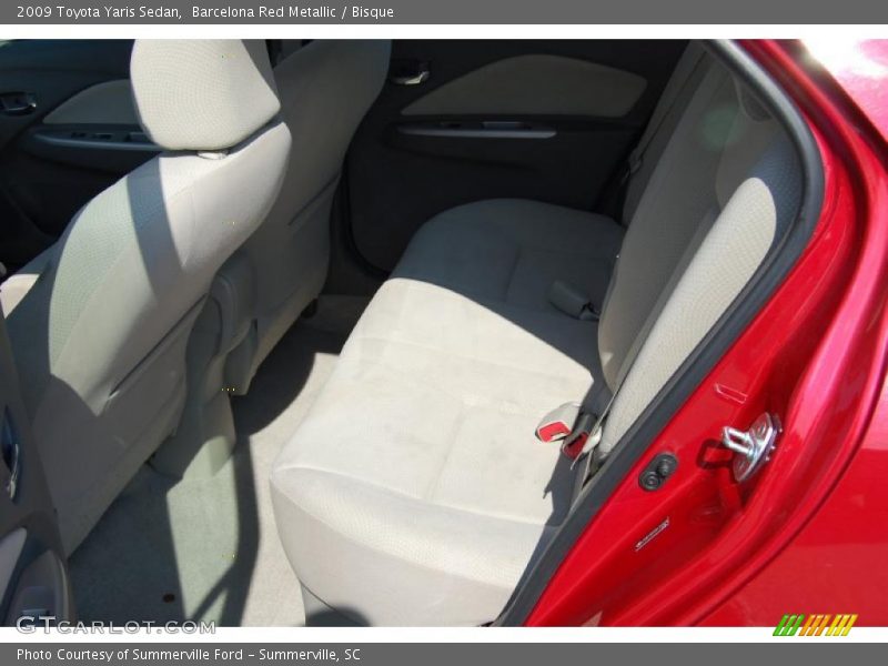 Barcelona Red Metallic / Bisque 2009 Toyota Yaris Sedan