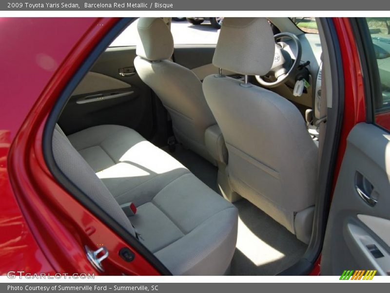 Barcelona Red Metallic / Bisque 2009 Toyota Yaris Sedan