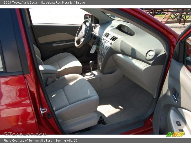Barcelona Red Metallic / Bisque 2009 Toyota Yaris Sedan
