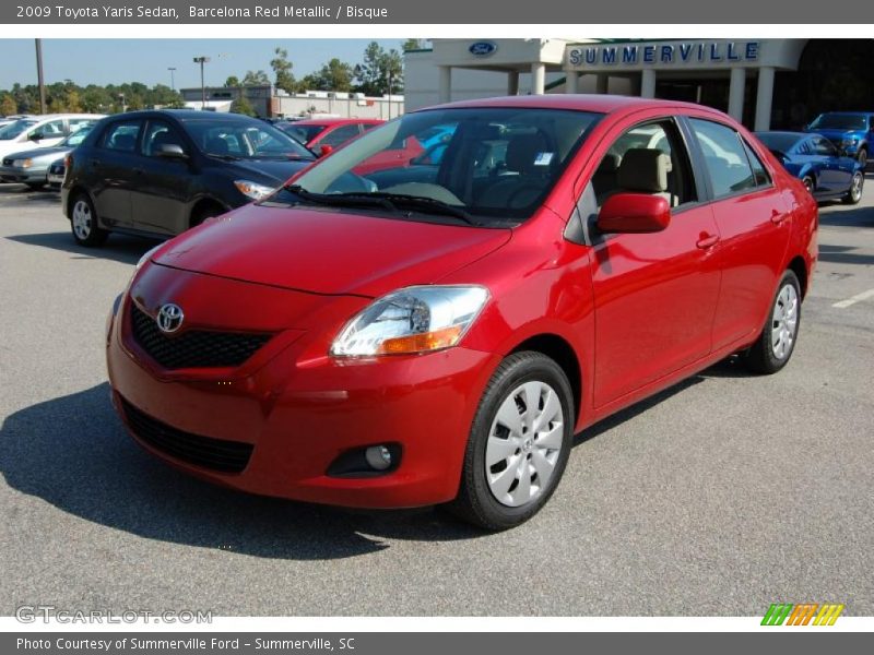 Barcelona Red Metallic / Bisque 2009 Toyota Yaris Sedan