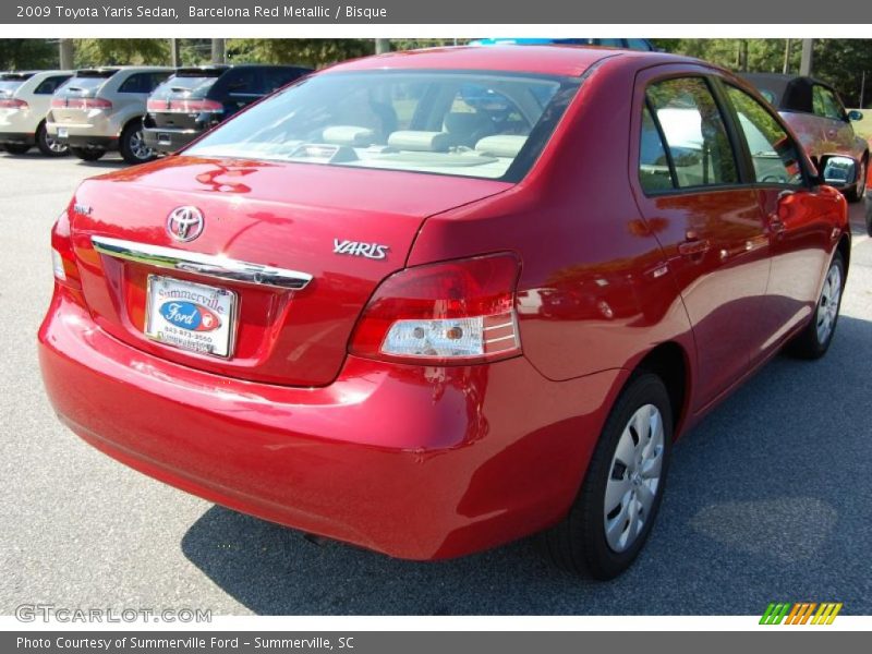 Barcelona Red Metallic / Bisque 2009 Toyota Yaris Sedan