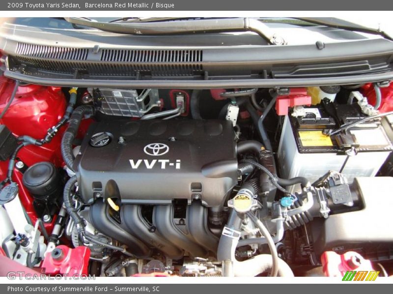 Barcelona Red Metallic / Bisque 2009 Toyota Yaris Sedan