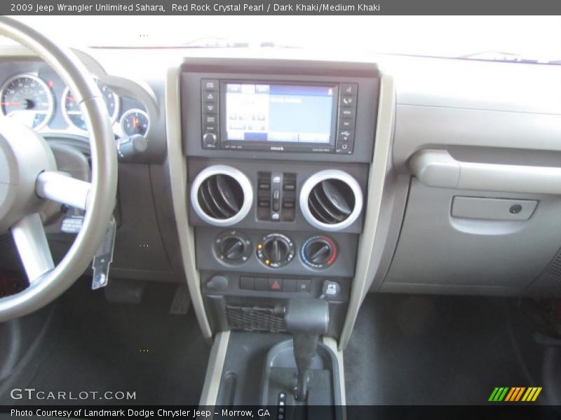 Red Rock Crystal Pearl / Dark Khaki/Medium Khaki 2009 Jeep Wrangler Unlimited Sahara