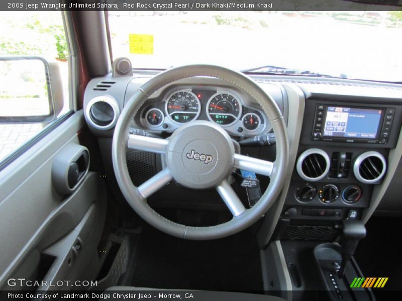 Red Rock Crystal Pearl / Dark Khaki/Medium Khaki 2009 Jeep Wrangler Unlimited Sahara