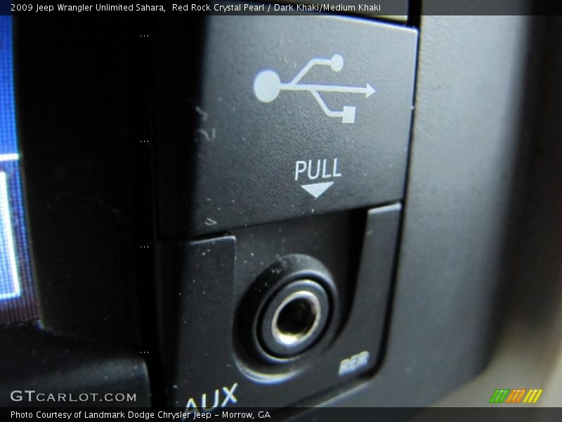 Red Rock Crystal Pearl / Dark Khaki/Medium Khaki 2009 Jeep Wrangler Unlimited Sahara