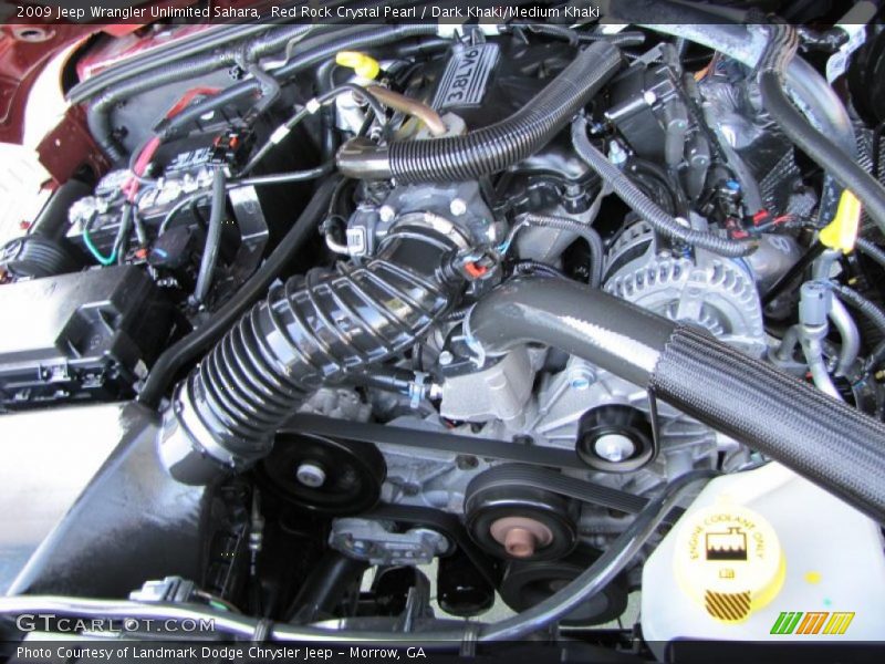 Red Rock Crystal Pearl / Dark Khaki/Medium Khaki 2009 Jeep Wrangler Unlimited Sahara