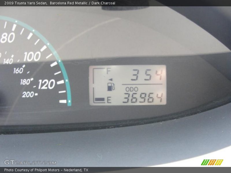 Barcelona Red Metallic / Dark Charcoal 2009 Toyota Yaris Sedan