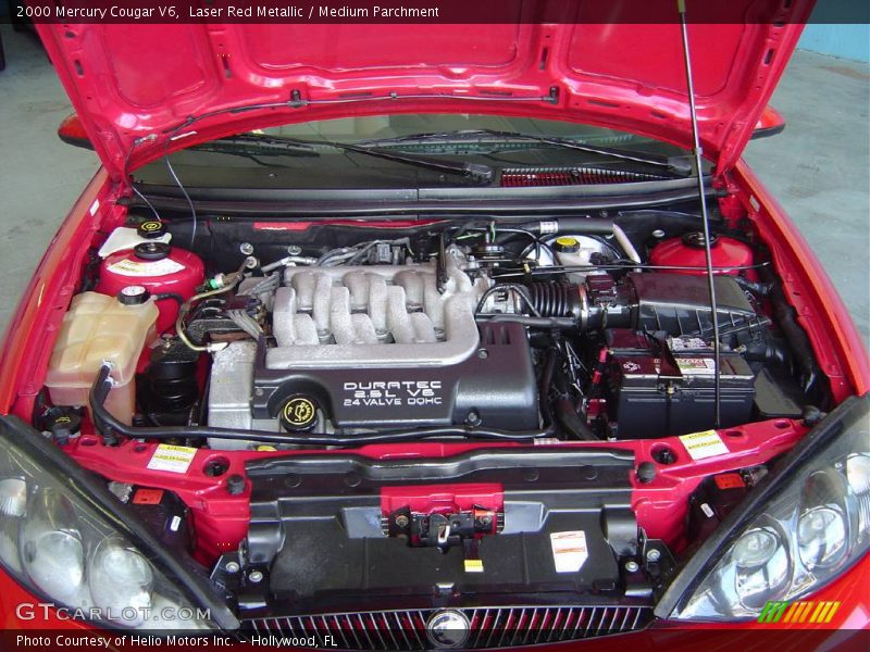 Laser Red Metallic / Medium Parchment 2000 Mercury Cougar V6