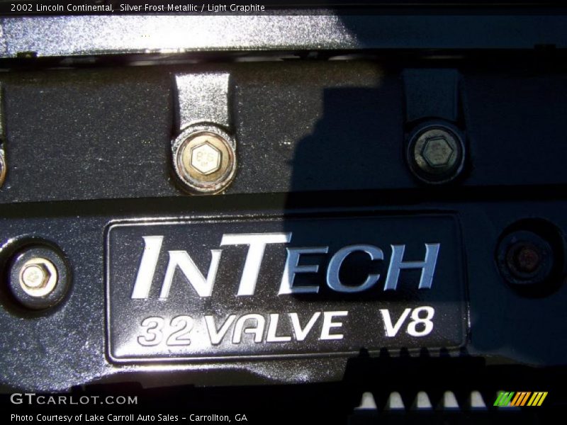 Silver Frost Metallic / Light Graphite 2002 Lincoln Continental