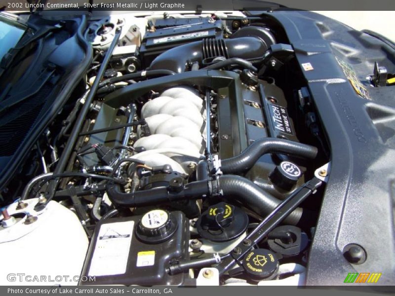 Silver Frost Metallic / Light Graphite 2002 Lincoln Continental