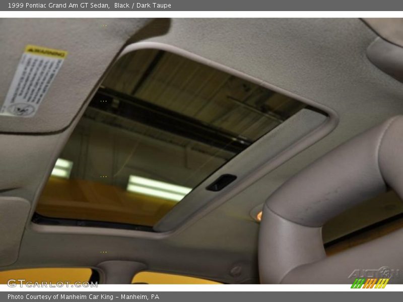 Black / Dark Taupe 1999 Pontiac Grand Am GT Sedan