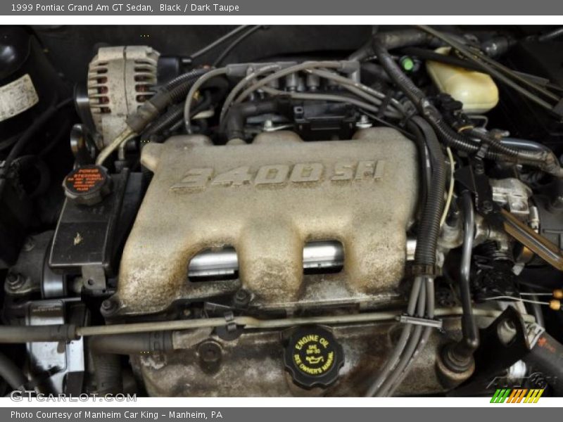 Black / Dark Taupe 1999 Pontiac Grand Am GT Sedan