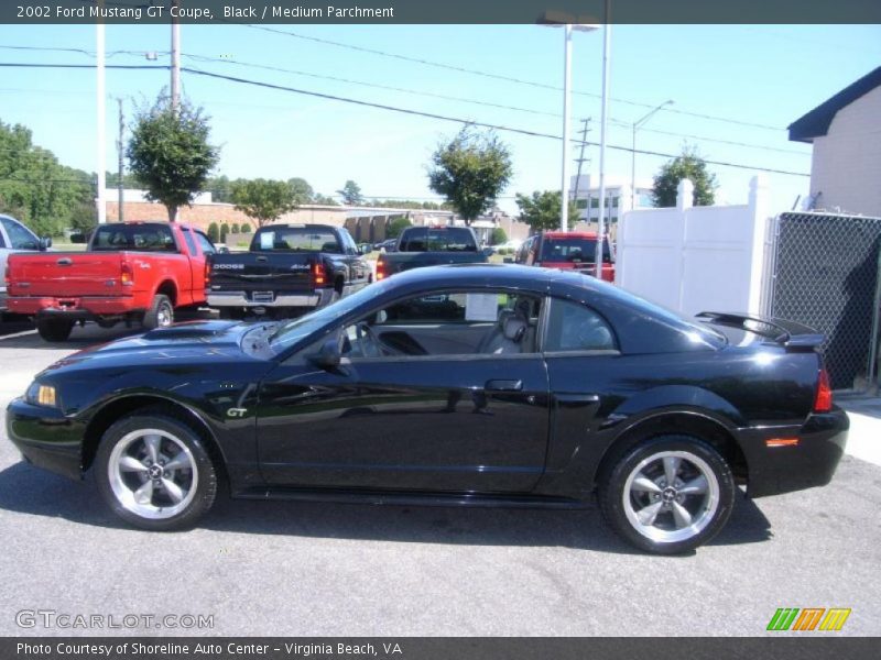 Black / Medium Parchment 2002 Ford Mustang GT Coupe