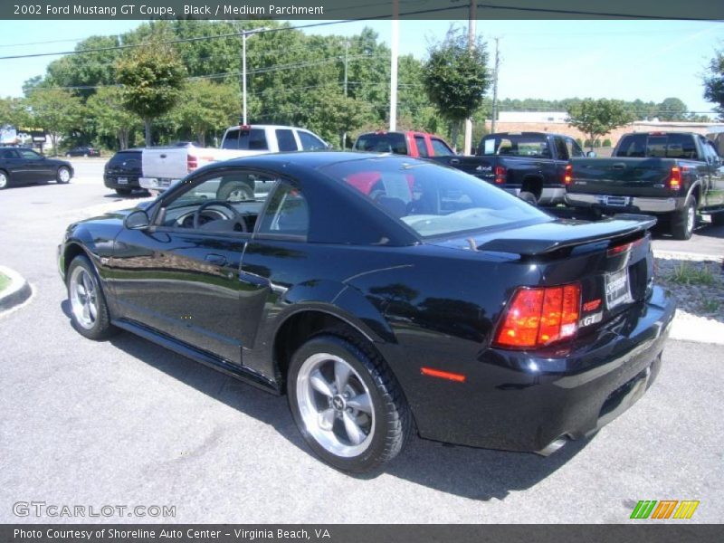Black / Medium Parchment 2002 Ford Mustang GT Coupe