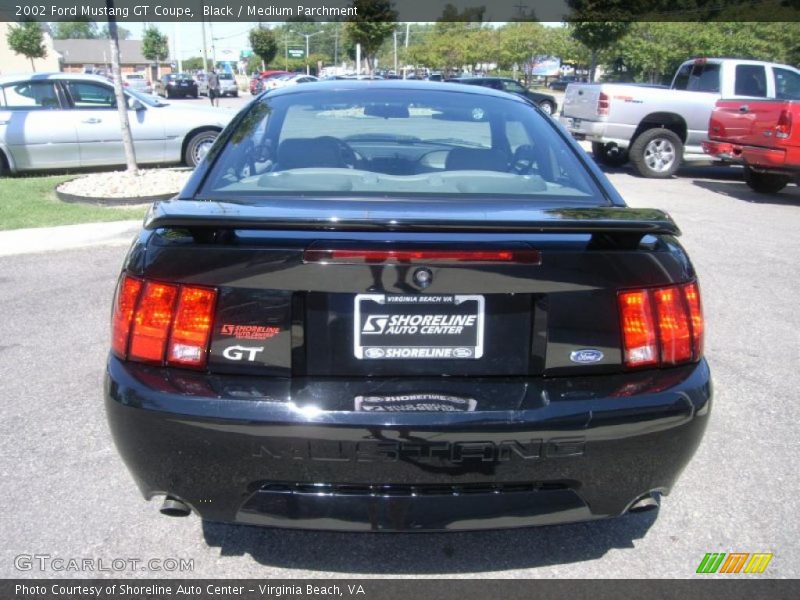 Black / Medium Parchment 2002 Ford Mustang GT Coupe