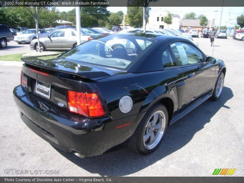 Black / Medium Parchment 2002 Ford Mustang GT Coupe