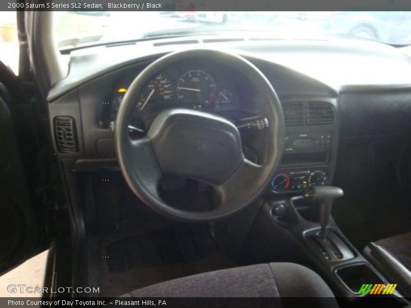 Blackberry / Black 2000 Saturn S Series SL2 Sedan