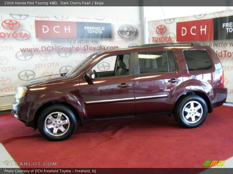 Dark Cherry Pearl / Beige 2009 Honda Pilot Touring 4WD