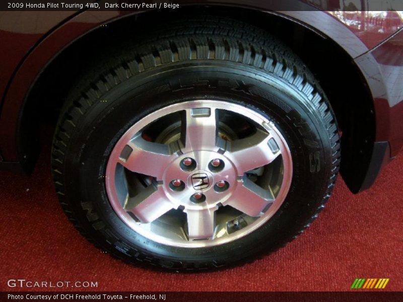Dark Cherry Pearl / Beige 2009 Honda Pilot Touring 4WD