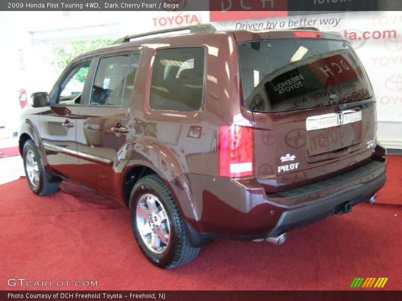 Dark Cherry Pearl / Beige 2009 Honda Pilot Touring 4WD