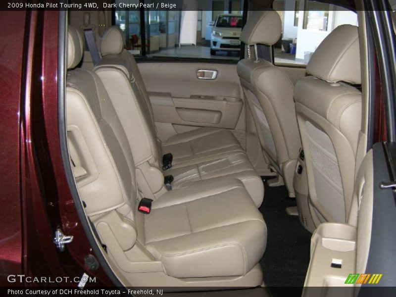 Dark Cherry Pearl / Beige 2009 Honda Pilot Touring 4WD
