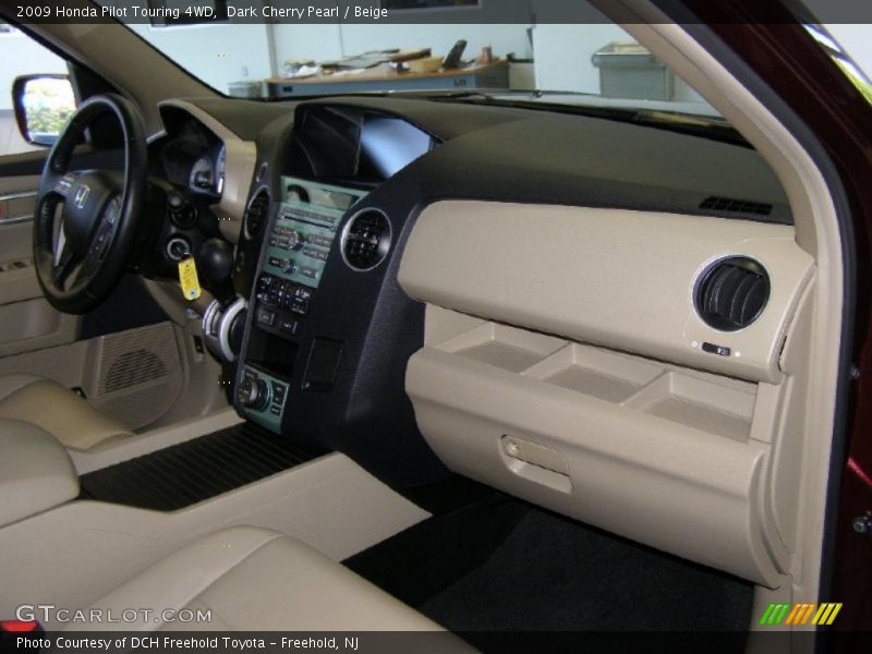 Dark Cherry Pearl / Beige 2009 Honda Pilot Touring 4WD