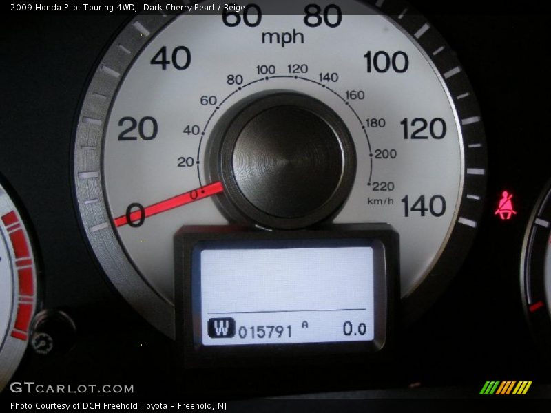 Dark Cherry Pearl / Beige 2009 Honda Pilot Touring 4WD