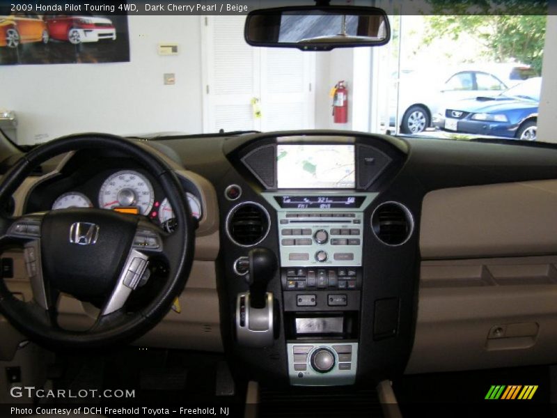 Dark Cherry Pearl / Beige 2009 Honda Pilot Touring 4WD