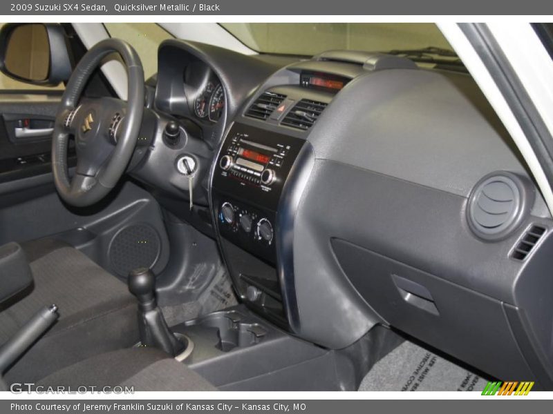 Quicksilver Metallic / Black 2009 Suzuki SX4 Sedan
