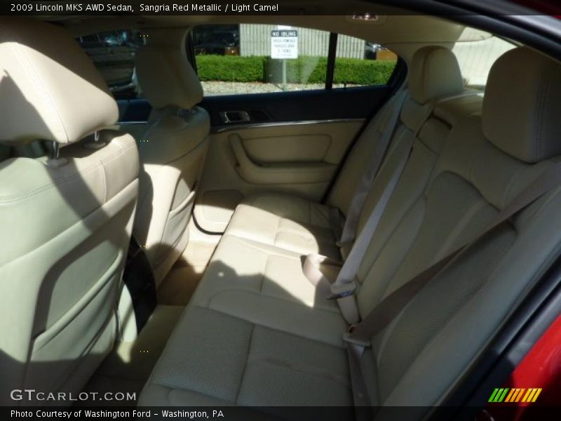 Sangria Red Metallic / Light Camel 2009 Lincoln MKS AWD Sedan