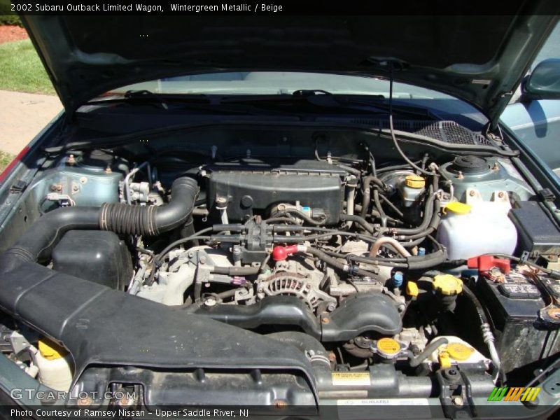 Wintergreen Metallic / Beige 2002 Subaru Outback Limited Wagon