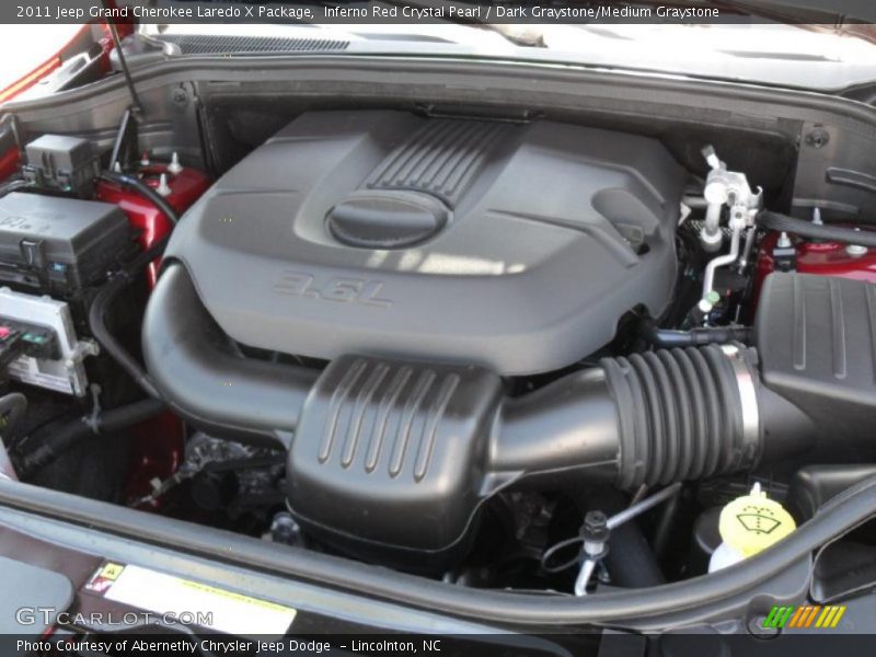 Inferno Red Crystal Pearl / Dark Graystone/Medium Graystone 2011 Jeep Grand Cherokee Laredo X Package
