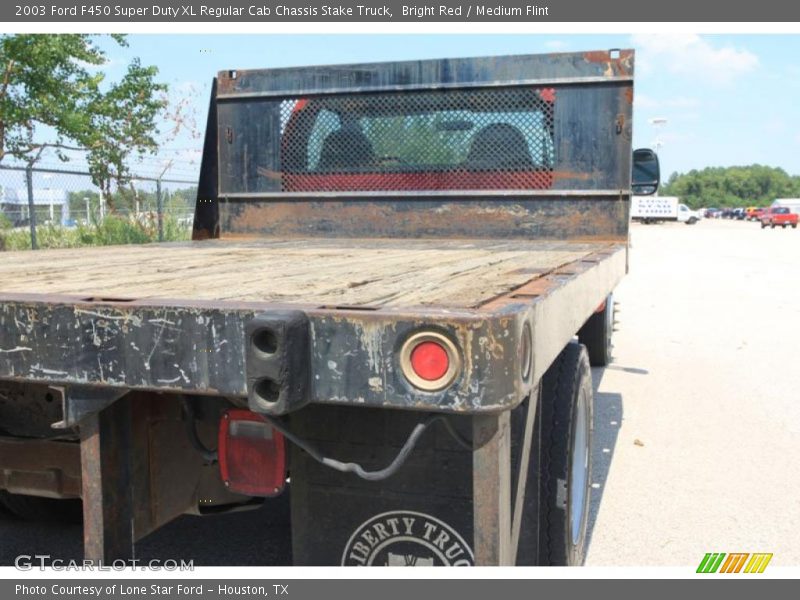 Bright Red / Medium Flint 2003 Ford F450 Super Duty XL Regular Cab Chassis Stake Truck