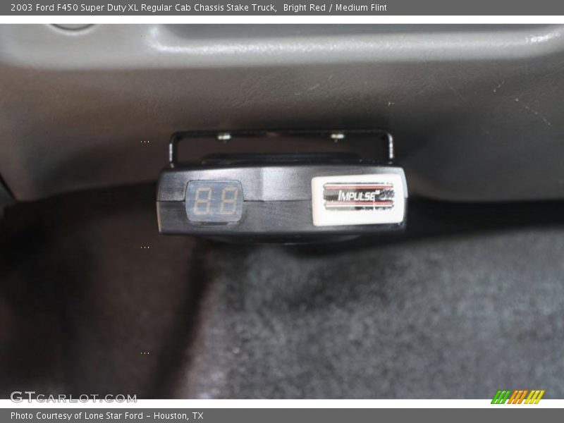 Bright Red / Medium Flint 2003 Ford F450 Super Duty XL Regular Cab Chassis Stake Truck