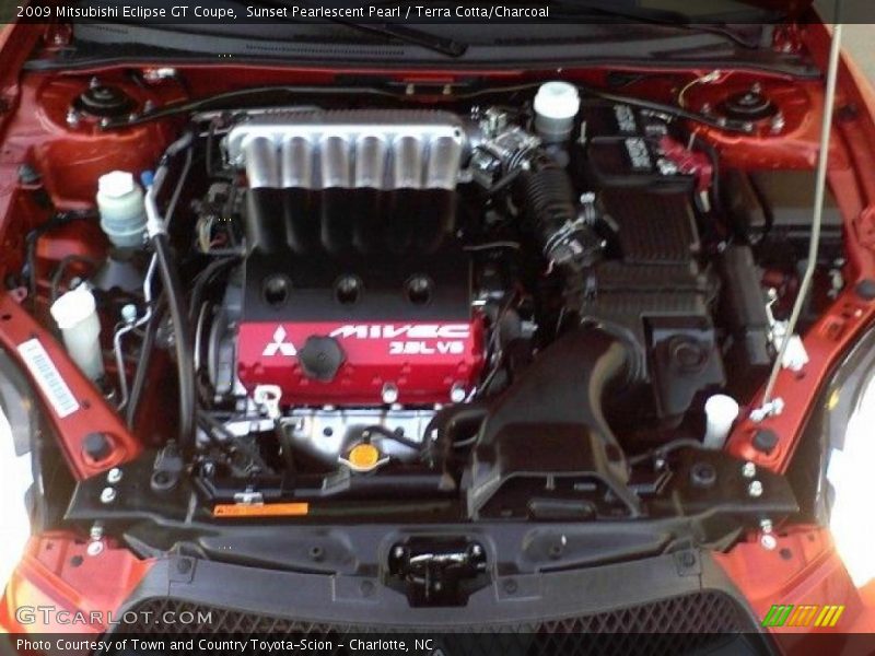 Sunset Pearlescent Pearl / Terra Cotta/Charcoal 2009 Mitsubishi Eclipse GT Coupe