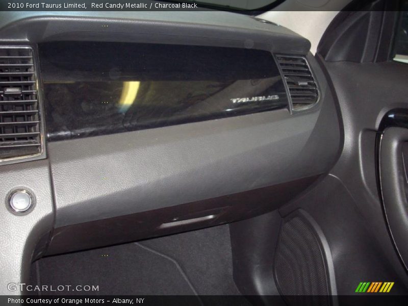 Red Candy Metallic / Charcoal Black 2010 Ford Taurus Limited