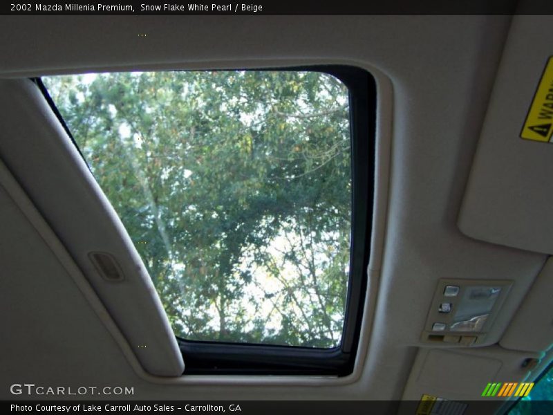 Snow Flake White Pearl / Beige 2002 Mazda Millenia Premium