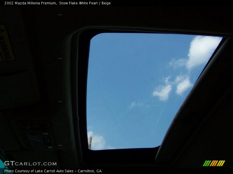 Snow Flake White Pearl / Beige 2002 Mazda Millenia Premium