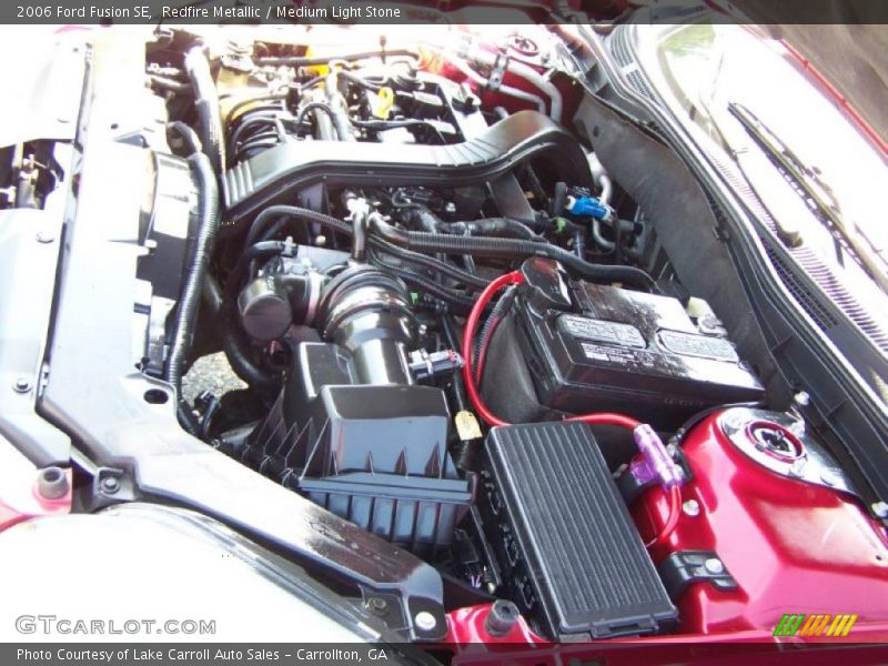 Redfire Metallic / Medium Light Stone 2006 Ford Fusion SE