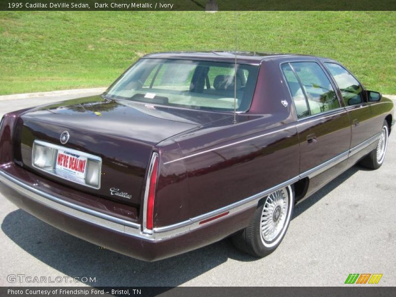 Dark Cherry Metallic / Ivory 1995 Cadillac DeVille Sedan