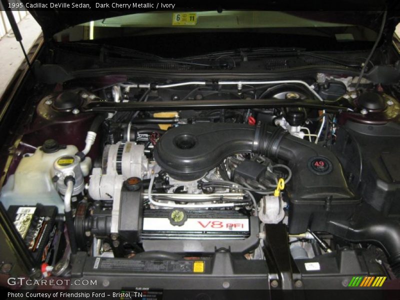 Dark Cherry Metallic / Ivory 1995 Cadillac DeVille Sedan