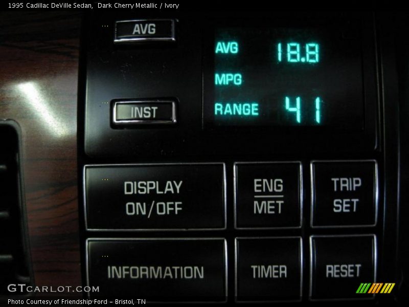 Dark Cherry Metallic / Ivory 1995 Cadillac DeVille Sedan